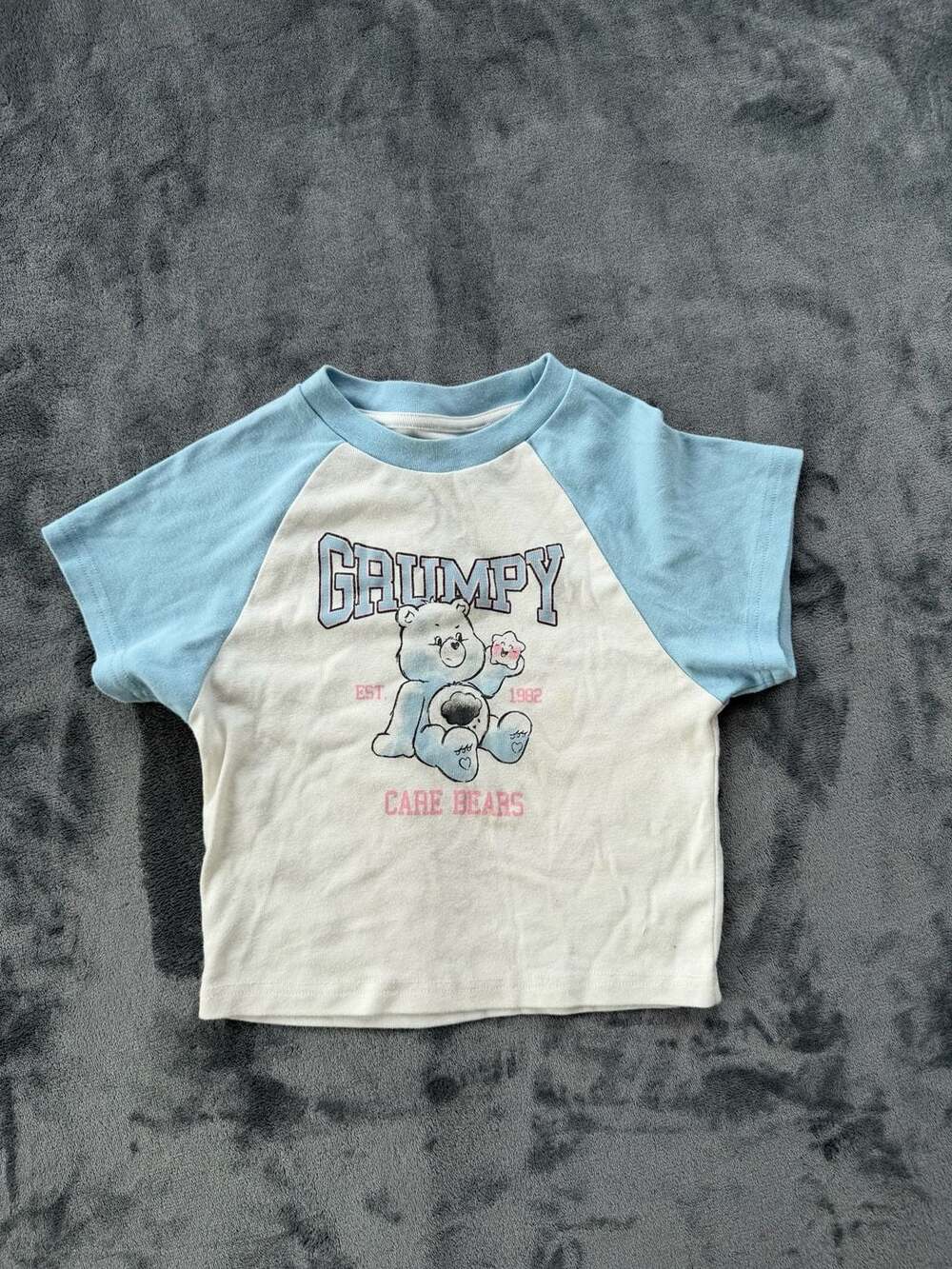 Care Bears Grumpy Blue White Raglan Crop Baby Tee